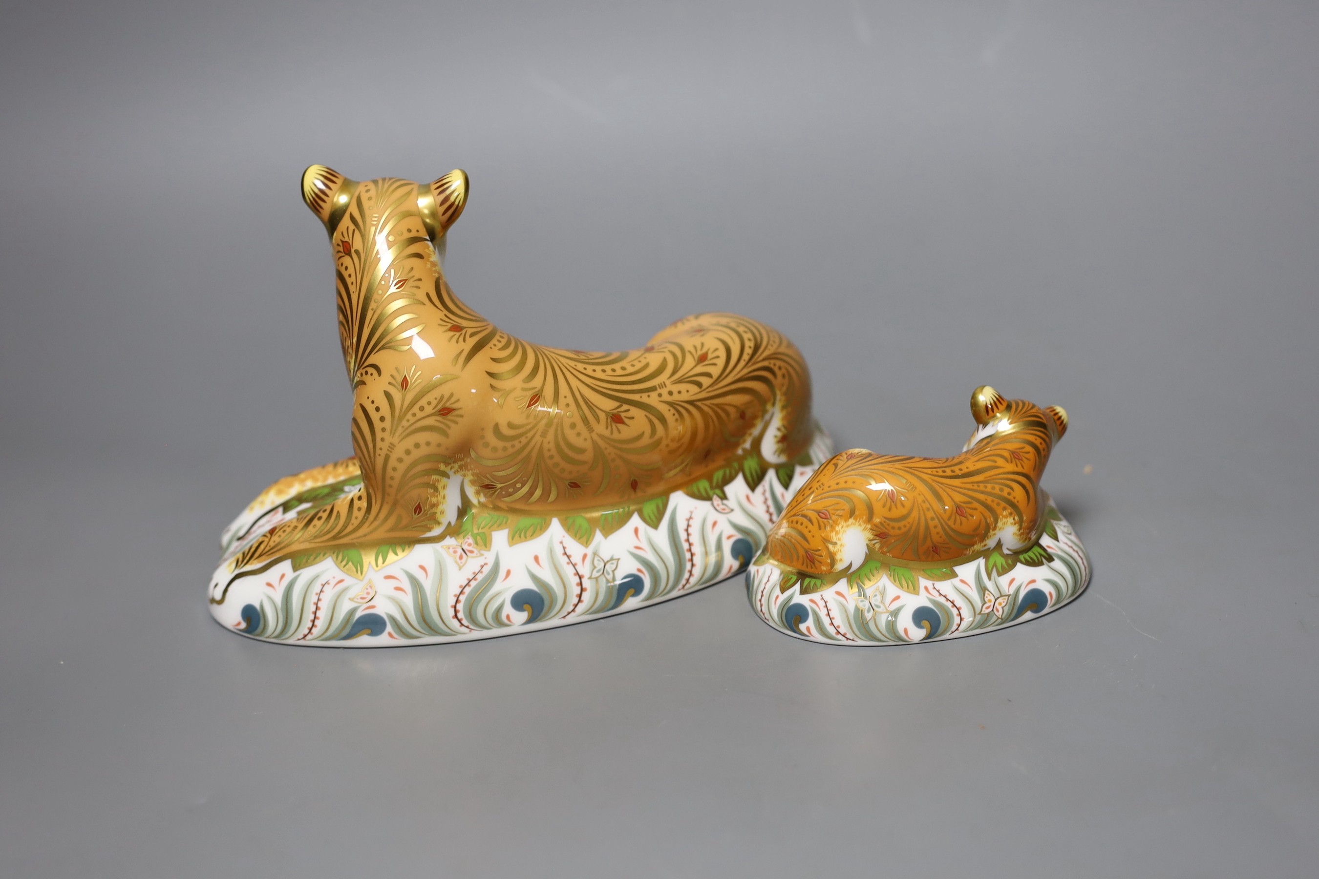 Two Royal Crown Derby paperweights - Lioness, gold stopper, boxed with certificate and Sleepy Lion Cub, gold stopper, boxed with certificate